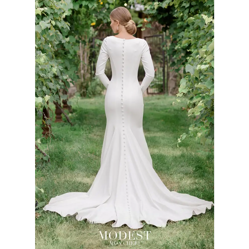 Modest wedding dresses that offer both classic style and on-trend design, this collection of wedding dresses with sleeves honors your traditions, values and integrity. princess seams, a zipper back with covered buttons down to the hem and a chapel train.#utahbridalshop #weddingdresses #weddingaccessories #bridalcloset #classyweddings #brides #utahweddings #designerweddinggowns #modestgowns #trendyweddingdresses #uniqueweddinggowns
