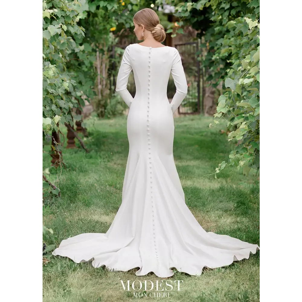 Modest wedding dresses that offer both classic style and on-trend design, this collection of wedding dresses with sleeves honors your traditions, values and integrity. princess seams, a zipper back with covered buttons down to the hem and a chapel train.#utahbridalshop #weddingdresses #weddingaccessories #bridalcloset #classyweddings #brides #utahweddings #designerweddinggowns #modestgowns #trendyweddingdresses #uniqueweddinggowns 