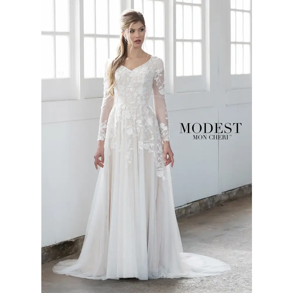 Stunning embroidered, sequin and beaded lace appliqués take center stage in this flowing tulle A-line gown with modesty cap sleeves under illusion lace long sleeves, a beaded curved slight V-neckline, a dropped waist, a concealed back zipper, and a softy gathered tulle skirt with a chapel train. Modest illusion long sleeve utah wedding gown #utahbridalshop #weddinggowns #sandyutah #bridalcloset #brides #bridalshop #utahwedding #designerweddings #templeready #weddingaccessories #modestweddingdress